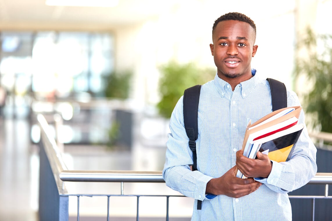 Happy African Man as Student